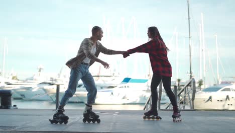 Happy-friends-riding-roller-skates-together