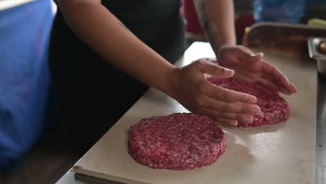 Crop-cook-preparing-cutlets-from-raw-minced-meat