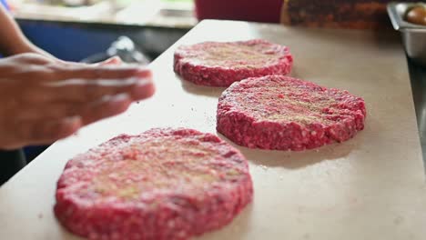 Crop-cook-preparing-cutlets-from-raw-minced-meat
