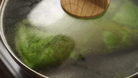 Anonymous-person-cooking-green-omelette