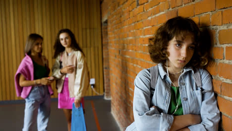 Teenager-listening-to-music-on-the-hallway