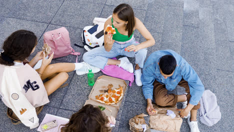 Friends-having-lunch-outdoors