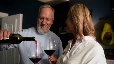 Couple-drinking-wine-at-home