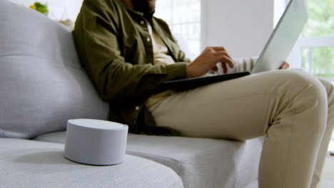 Close-up-view-of-smart-speaker-on-the-sofa