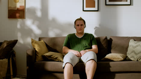 Guy-with-headphones-at-home