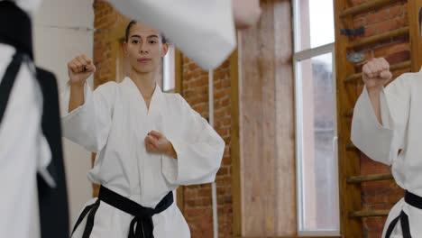 Master-teaching-the-moves-at-the-dojo