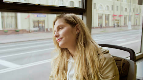 Close-up-view-of-young-woman-in-the-bus