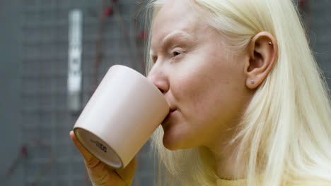 Closeup-of-woman-drinking-coffee