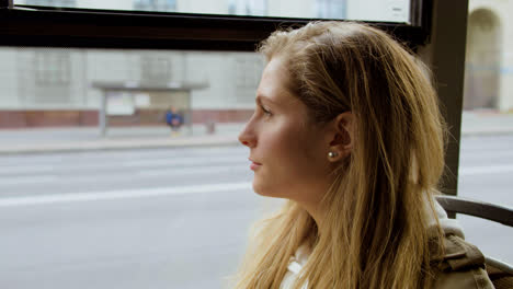 Close-up-view-of-young-woman-in-the-bus