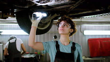 Woman-inspecting-automobile