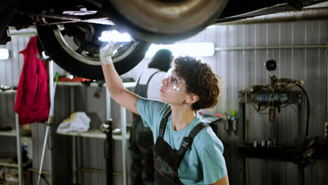 Woman-inspecting-automobile