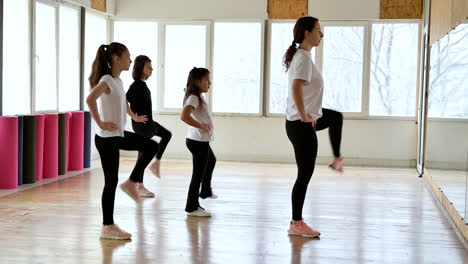 Teacher-and-girls-in-dance-class
