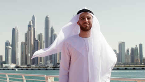 Man-in-arabic-clothing-posing-outdoors