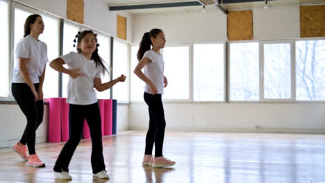 Teacher-and-pupils-in-dance-class