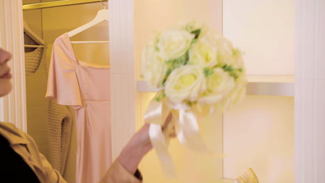Unrecognizable-woman-in-wedding-dress-shop