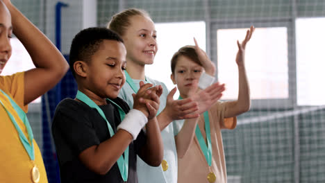 Kids-receiving-gold-medal
