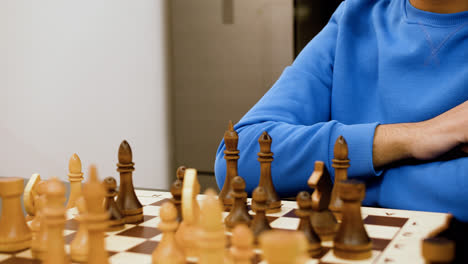 Man-playing-chess