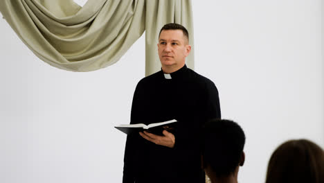 Priest-with-the-Bible
