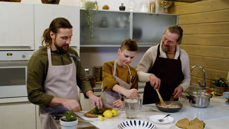 Caucasian-men-and-boy-in-the-kitchen
