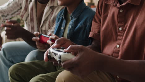 Boy-playing-video-games-with-family