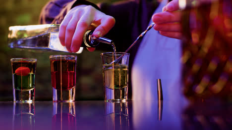 Bartender-preparing-shots