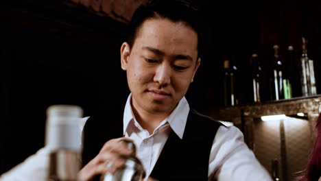 Bartender-using-cocktail-shaker