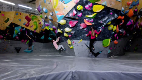 Teenagers-bouldering-in-a-gym