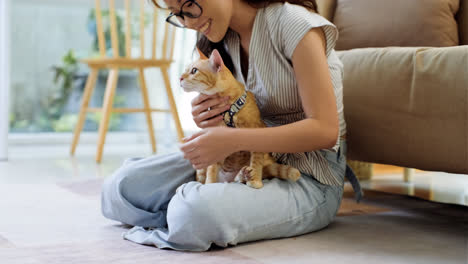 Woman-petting-a-cat