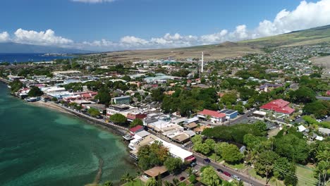 Cinematic-Aerial-Shot-of-the-Historic-Front-Street-in-Lahaina,-Maui,-Prior-to-being-burned-down-in-the-2023-Maui-Wildfires