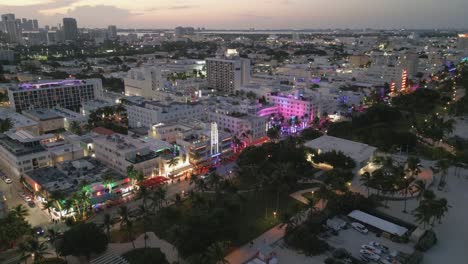 Miami-South-beach-Florida-illuminated-at-night-during-sunset-aerial-drone