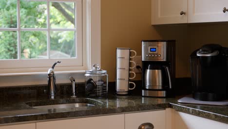revealing-shot-of-a-coffee-station-in-the-kitchen-of-a-home