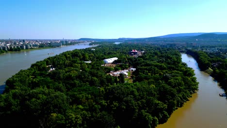 Aerial-View-Over-Location-Of-Sziget-Festival-In-Óbuda-Island,-Budapest,-Hungary---drone-shot