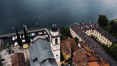 Overhead-aerial-view-orbiting-the-Bellagio-church-in-Italy's-rural-countryside