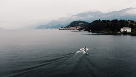 Aerial-view-of-a-boat-cruising-around-Lake-Como-near-the-Italian-town-of-Bellagio