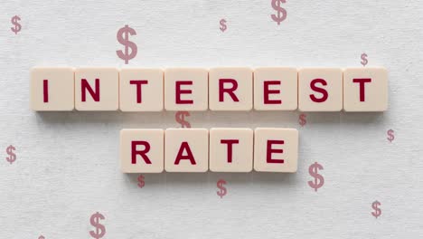 Interest-Rate-Words-Spelled-Out-On-Scrabble-Tiles-With-Red-Dollar-Signs-Going-Up