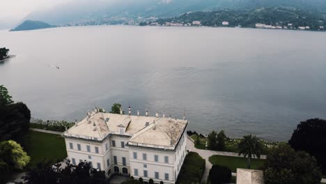 Aerial-view-of-Villa-Melzi-D'Eril-sitting-on-Lake-Como's-secluded-shoreline