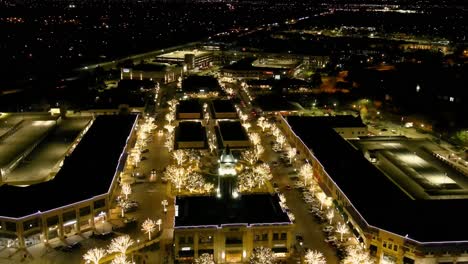 Drone-Video-of-The-LaCenterra-Shopping-Center-in-Katy,-Texas-at-Night