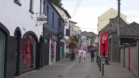 People-walking-on-a-Shopping-Mall-in-Kilkenny-City-on-a-warm-Sunday-morning-in-September
