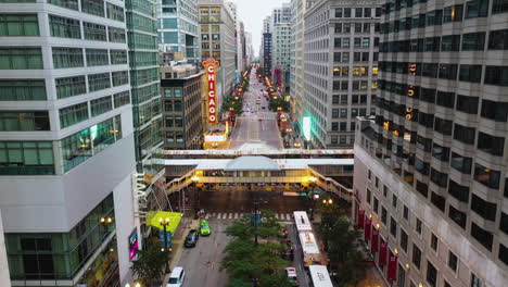 Aerial-view-over-the-State-Lake-station-at-the-illuminated-North-State-Street,-in-Chicago