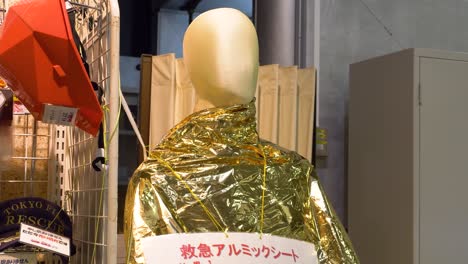 Close-up-shot-of-foil-blankets-on-a-model-within-the-Honjo-Safety-learning-Center