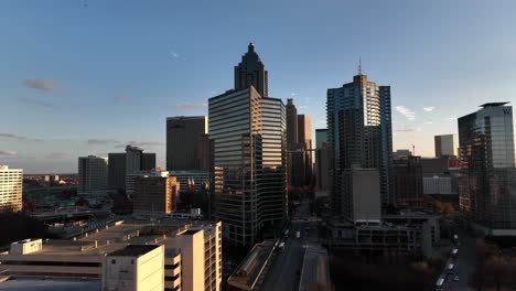 Downtown-Atlanta-Peachtree-Street-famous-skyline-buildings-in-the-background,-Sunlight-falling-on-modern-skyline-buildings