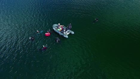 SCUBA-diving-club-in-Lake-Laukezers-large-freshwater-nature-park---aerial-orbit