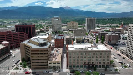 Downtown-Colorado-Springs,-CO-with-Pikes-Peak-in-Rocky-Mountains-in-background