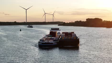 Golden-hour-at-Barendrecht-and-the-cargo-ship-the-Colorado-sails-on-the-river-Oude-Maas