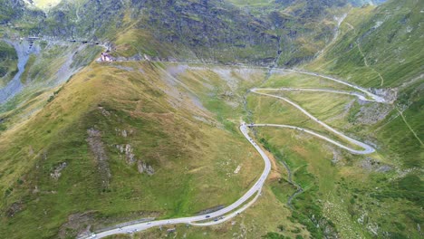 Aerial-trucking-pan-of-Transfagarasan-Serpentine-Road-overview-of-extreme-landscape