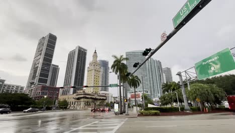 Miami-bayfront-park-downtown-with-port-miami-sign,-rainy-overcast-midday-static-establishing