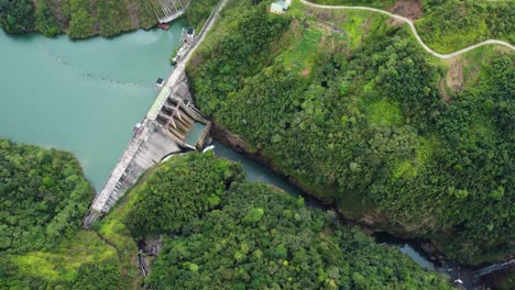 Birdseye-footage-of-a-Dam-and-running-water-at-the-Ha-Giang-Loop,-Vietnam