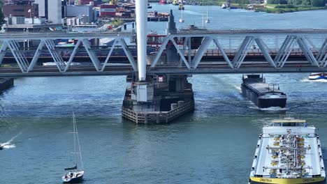 Busy-shipping-lanes-of-the-Oude-Maas-river-under-the-Railway-Bridge-at-Dordrecht