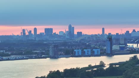 As-the-orange-sunrises-in-the-distance-the-city-of-Rotterdam-wakes
