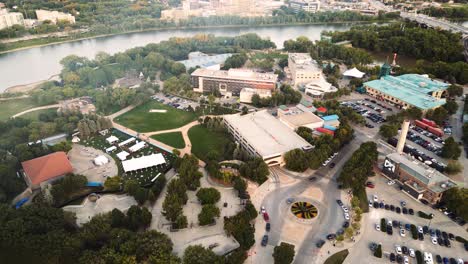 A-Sunset-Golden-Hour-Aerial-View-of-the-Urban-Park-Canadian-Museum-for-Human-Rights-The-Forks-Market-Village-Downtown-Winnipeg-Shaw-Park-Provencher-Bridge-Red-River-in-Manitoba-Canada